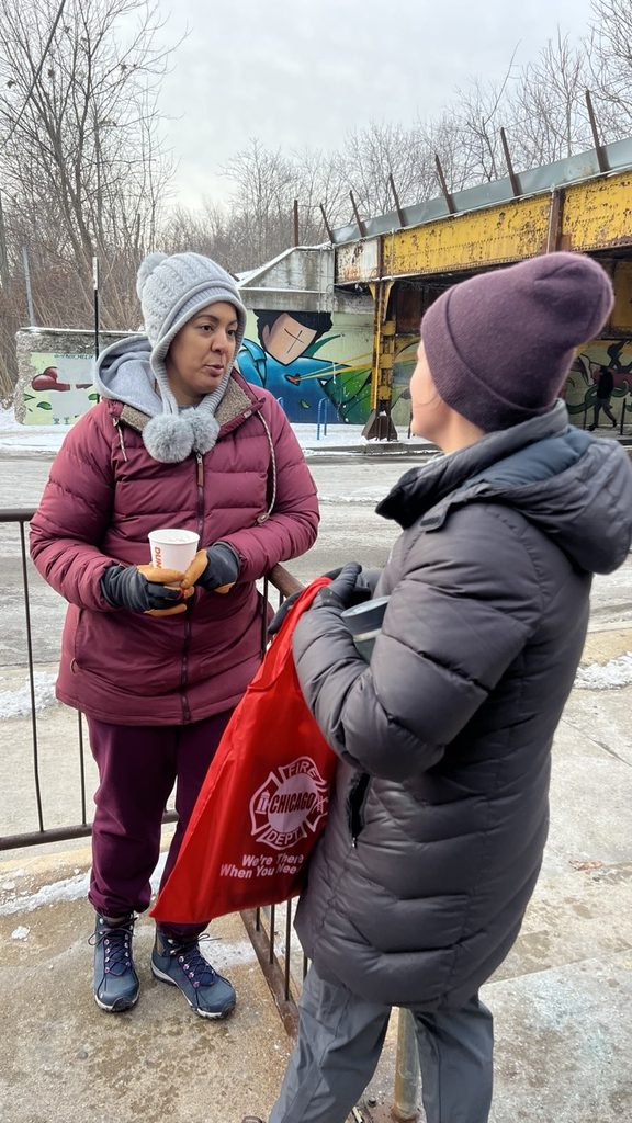 Alderwoman Maria Hadden helped distribute coffee to community members on Valentine's Day with Young Masterbuilders In Motion volunteers.